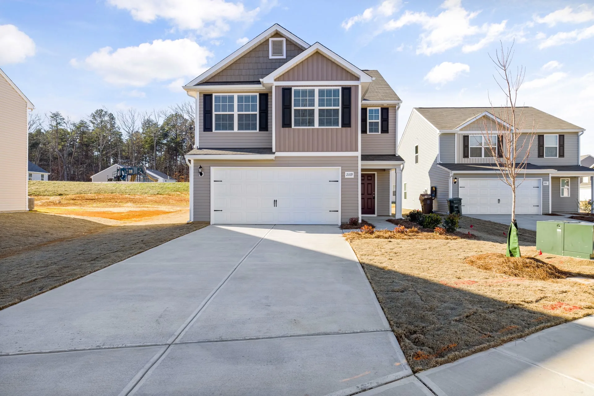 Residential concrete driveway illustration (stock photo, not a local Akron job)